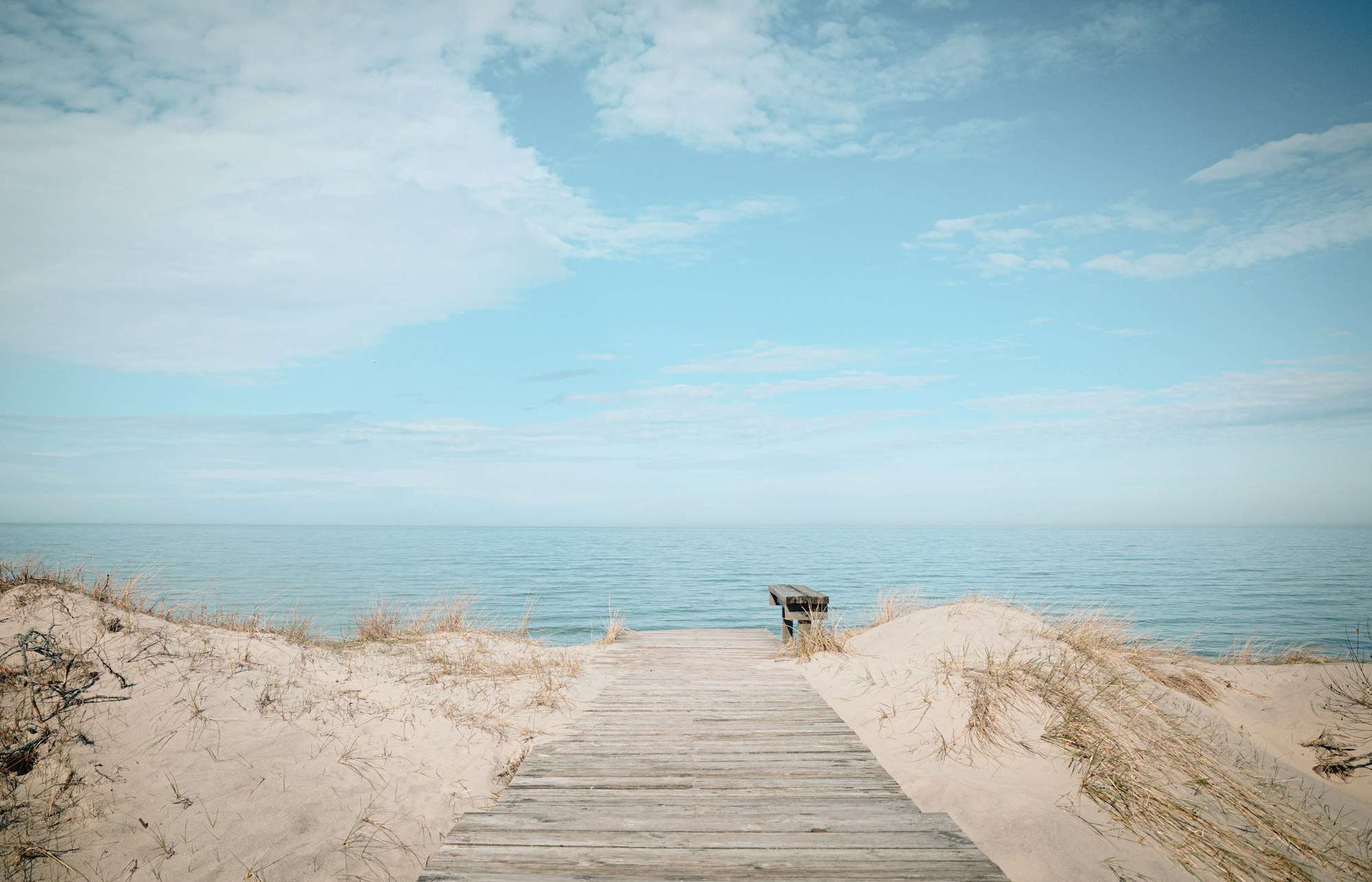 Wooden boardwalk leading to a Curonian Spit beach
